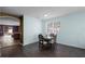 Casual dining area with a view into the living room at 326 Highland Meadows Ave, Davenport, FL 33837