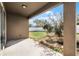 Covered patio overlooking backyard at 326 Highland Meadows Ave, Davenport, FL 33837