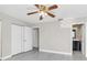 Bedroom with ceiling fan and en-suite bathroom at 733 Preble Ave, Altamonte Springs, FL 32701