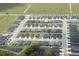 An aerial view showing the layout of this beautiful community and the surrounding landscape at 10 Pilot Pl, Winter Haven, FL 33881
