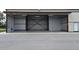 Spacious hangar with metal frame, doors, and concrete flooring at 10 Pilot Pl, Winter Haven, FL 33881