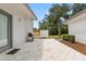Backyard patio area featuring a grill, perfect for outdoor cooking and dining at 12550 Lakeshore Dr, Clermont, FL 34711