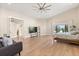 Spacious bedroom featuring high ceilings, wood floors, and abundant natural light at 12550 Lakeshore Dr, Clermont, FL 34711