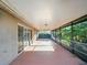 Screened patio providing an outdoor living space, with views of the lush landscaping at 12924 Lower River Blvd, Orlando, FL 32828