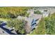 Aerial view of a townhome community, showcasing rooftops and landscaping at 2203 San Vittorino Cir # 102, Kissimmee, FL 34741
