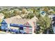 Aerial view of a townhome community near a lake at 2203 San Vittorino Cir # 102, Kissimmee, FL 34741