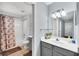 Clean bathroom with shower/tub combo and updated vanity at 2203 San Vittorino Cir # 102, Kissimmee, FL 34741