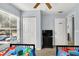 Charming bedroom with twin beds, TV, and ample closet space at 2203 San Vittorino Cir # 102, Kissimmee, FL 34741