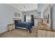 Spacious bedroom with a queen bed, dresser, and ceiling fan at 2203 San Vittorino Cir # 102, Kissimmee, FL 34741
