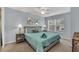 Spacious bedroom with a queen-size bed and lots of natural light at 2203 San Vittorino Cir # 102, Kissimmee, FL 34741