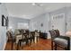 Combined living and dining area with hardwood floors at 2203 San Vittorino Cir # 102, Kissimmee, FL 34741