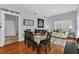 Bright dining area with table, chairs, and hardwood floors at 2203 San Vittorino Cir # 102, Kissimmee, FL 34741