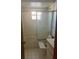 Bathroom featuring a shower and tub combination with sliding glass doors at 118 Cedar Rd, Ocala, FL 34472