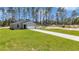 New single-Gathering home with a wide driveway and well-maintained lawn at 13516 Sw 78 Pl, Dunnellon, FL 34432