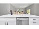 Spacious kitchen island with quartz countertops, stainless steel appliances and black faucet fixture at 13516 Sw 78 Pl, Dunnellon, FL 34432