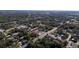 Aerial view of neighborhood showcasing tree-lined streets with well-maintained homes, offering a peaceful community setting at 205 E 17Th St, Apopka, FL 32703