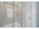 Bathroom shower with glass enclosure, tile surround and shower head at 1162 Happy Forest Loop, Deland, FL 32720