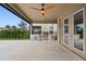 Outdoor kitchen and patio with pool view at 12983 Westside Village Loop, Windermere, FL 34786