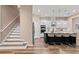 Modern staircase with wood steps and white risers at 12983 Westside Village Loop, Windermere, FL 34786