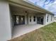 Covered back porch with ceiling fan, offering a relaxing outdoor living space at 0 Oberly Pkwy, Orlando, FL 32833