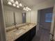 Modern bathroom with double vanity and tile flooring at 1200 Bear Oak Ln, Deland, FL 32720