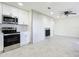 Modern kitchen features stainless appliances, new cabinets, and stylish backsplash at 2239 River Ridge Rd, Deland, FL 32720