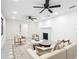 Spacious living room features fireplace, ceiling fans, and neutral decor at 2239 River Ridge Rd, Deland, FL 32720