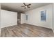 Spacious bedroom with ceiling fan and vinyl flooring at 541 Willet Cir, Auburndale, FL 33823