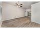 Living room features vinyl flooring and a ceiling fan at 541 Willet Cir, Auburndale, FL 33823