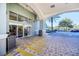 Welcoming building entrance with sliding doors, covered drop-off area and ample parking at 7383 Universal Blvd # 512, Orlando, FL 32819