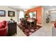 Cozy dining room features a large mirror accent wall, perfect for intimate gatherings and dinner parties at 2948 Banana Palm Dr, Kissimmee, FL 34747