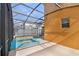 Backyard patio featuring a refreshing spa and pool combination for relaxation and recreation at 2948 Banana Palm Dr, Kissimmee, FL 34747