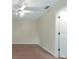 Spacious bedroom with wood floors and a ceiling fan at 349 Plantation Club Dr, Debary, FL 32713