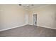 Spacious bedroom featuring hardwood floors and access to a private bathroom at 349 Plantation Club Dr, Debary, FL 32713