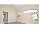 Bright bedroom with hardwood floors, large windows, and ensuite bathroom at 349 Plantation Club Dr, Debary, FL 32713