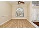 Formal dining room with hardwood floors and large window at 349 Plantation Club Dr, Debary, FL 32713