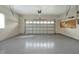 Attached garage with ample space and epoxy flooring at 349 Plantation Club Dr, Debary, FL 32713