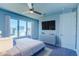 Stylish bedroom features a large window and modern furnishings at 7760 Sandy Ridge Dr # 222, Kissimmee, FL 34747