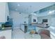 Modern kitchen with stainless steel appliances and open layout to living area at 7760 Sandy Ridge Dr # 222, Kissimmee, FL 34747