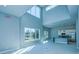 Spacious living room with high ceilings, large windows and open floor plan at 7760 Sandy Ridge Dr # 222, Kissimmee, FL 34747