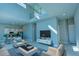 Open concept living area with modern decor and loft, perfect for entertaining at 7760 Sandy Ridge Dr # 222, Kissimmee, FL 34747