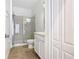 Bathroom with a glass door shower and modern fixtures at 8914 Dove Valley Way, Davenport, FL 33896