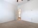 Spacious bedroom with neutral carpet and a view to the outside at 8914 Dove Valley Way, Davenport, FL 33896