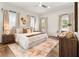 Inviting main bedroom with large windows, neutral decor, and a cozy atmosphere at 1606 Hart Ln, Orlando, FL 32804