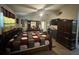 Large main bedroom with hardwood flooring, a ceiling fan, and ample space for furniture at 2212 Atrium Cir, Orlando, FL 32808