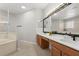 Spacious bathroom with dual sinks, a soaking tub, and a separate glass-enclosed shower at 698 Mt Pleasant Dr, Ocoee, FL 34761