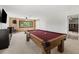 This game room has a pool table, rustic wood accents and plenty of room to entertain at 698 Mt Pleasant Dr, Ocoee, FL 34761