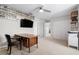 Home office features built-in shelving, a large desk, and ample space at 698 Mt Pleasant Dr, Ocoee, FL 34761
