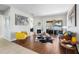 Bright living room with hardwood floors, fireplace, and stylish furnishings at 698 Mt Pleasant Dr, Ocoee, FL 34761