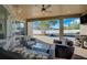 Relaxing patio with pool view, outdoor kitchen, and comfortable seating at 698 Mt Pleasant Dr, Ocoee, FL 34761